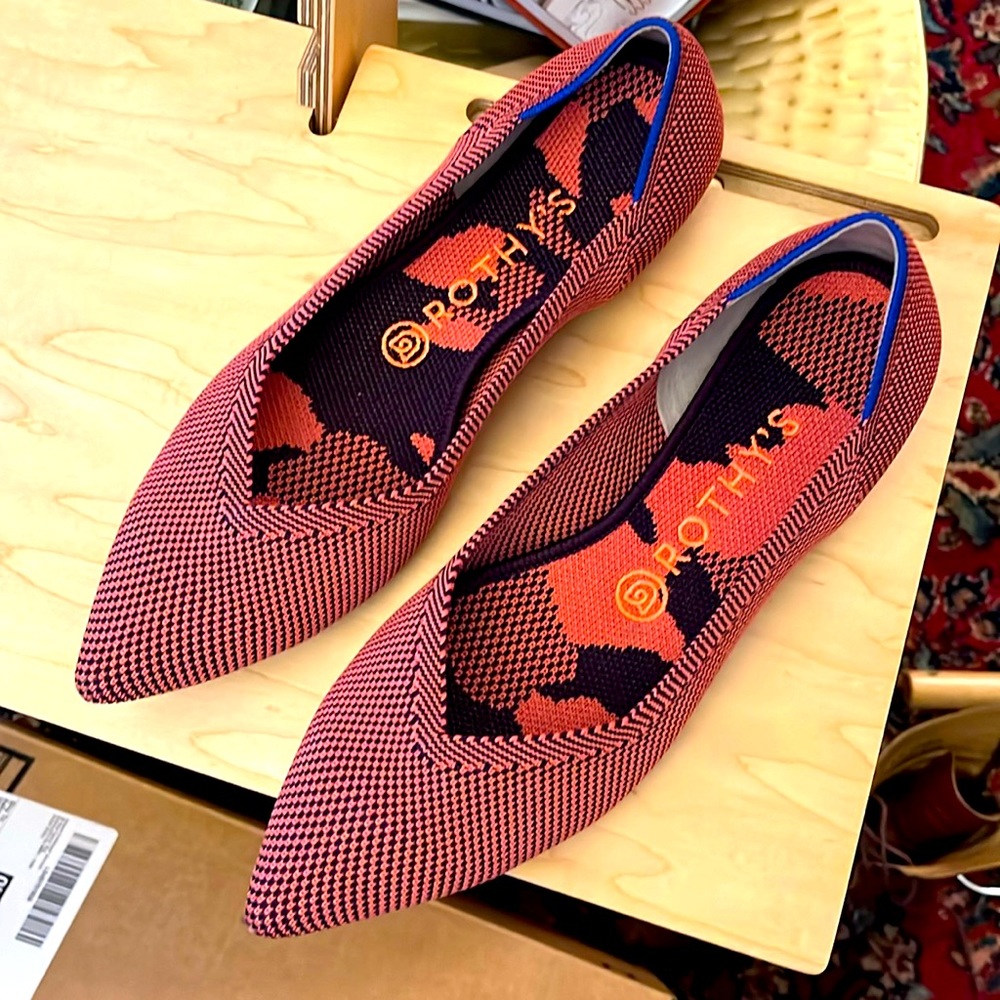 Brand new Rothy’s, never worn. Pink and purple checked with printed insole.